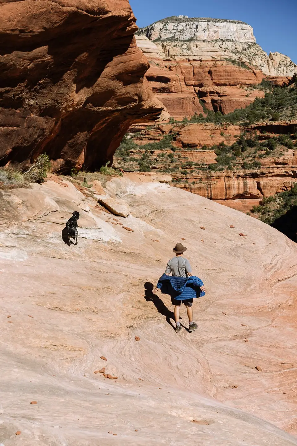 Evan walking on cliff ledges near Kachina Tree