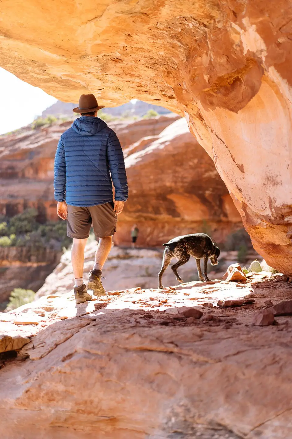 Evan and Penelope walking on cliff ledges