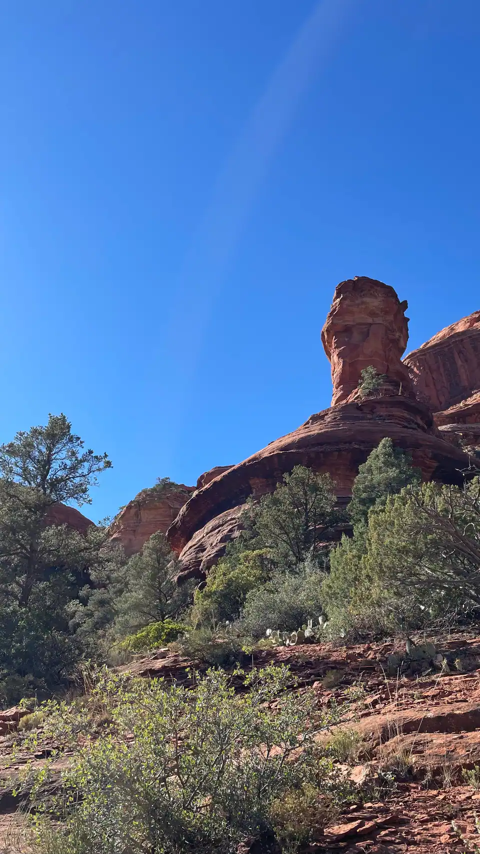 Rock spire to the right of the trail